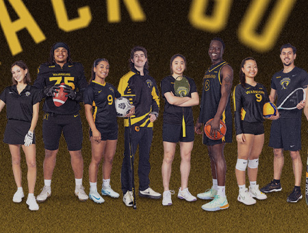 Students representing various sports team standing in front of a black and gold background